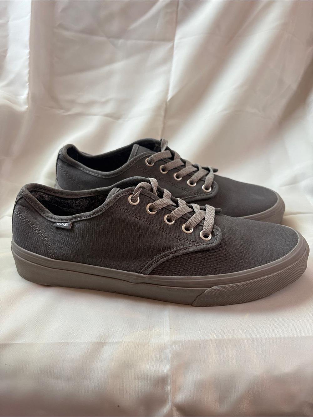 Vans with medallion details